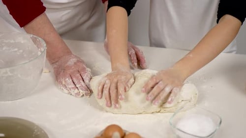 Close Up Hands Little Girl Kneading Dough Grandmother Enjoy Process of Cooking Pie with