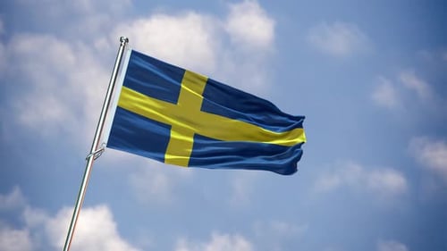 Swedish Flag Waving on Flagpole Against Cloudy Sky