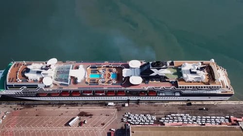 Large cruise ship docked at port - Aerial footage