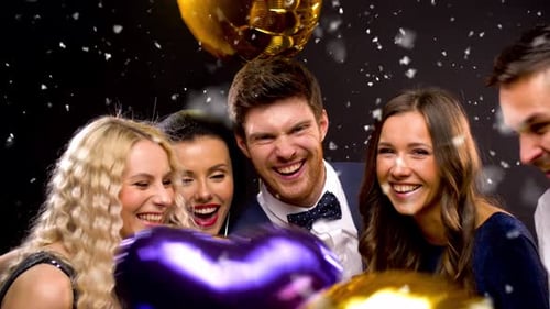 Joyful Friends Celebrate with Balloons and Confetti