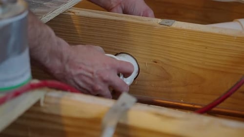 Hands Install White Pipe With Leveling Tool