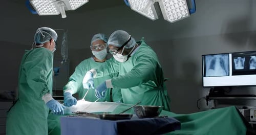 Surgical Team Performing Operation in Hospital Operating Room