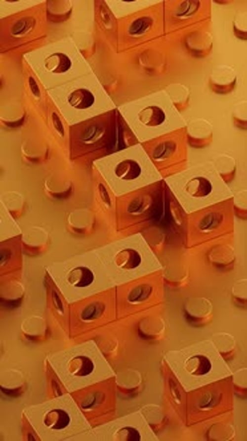 Orangefarbene Würfel mit Löchern drehen sich und bewegen sich. Vertikal geschlungenes Video