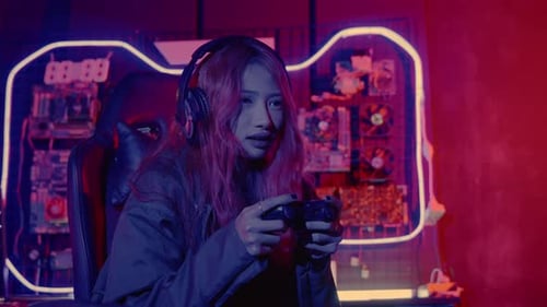 Young Woman Plays Video Game, Wins