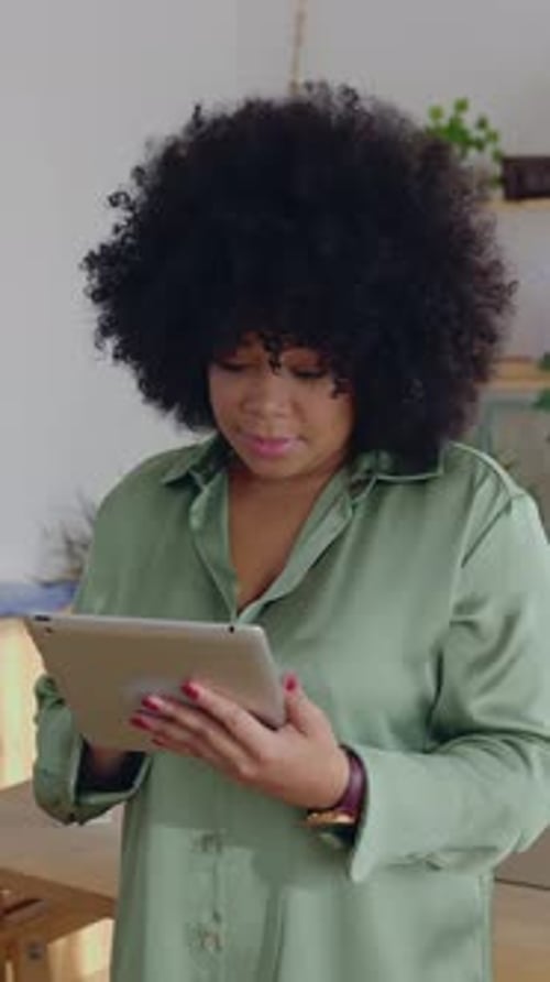 Young Latin American Business Entrepreneur Woman Using Digital Tablet at Office