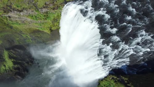 Skogafoss Waterfall in Iceland Summer Season in Mountain Beautiful Nature Landscape
