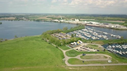 Aerial drone view of the beautiful landscape of the Netherlands and small harbor in the countryside.