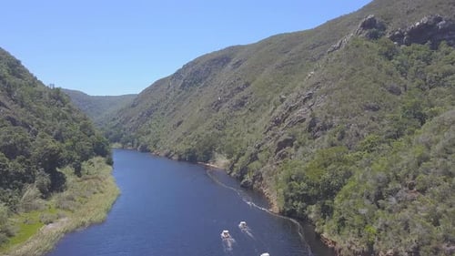 Aerial of boating on lake in South Africa for summer leisure fun and activity