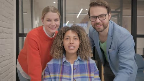 Mixed Race People Doing Video Chat in Office