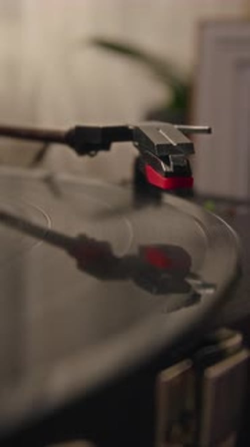 Hand Setting Needle on Vintage Record Player