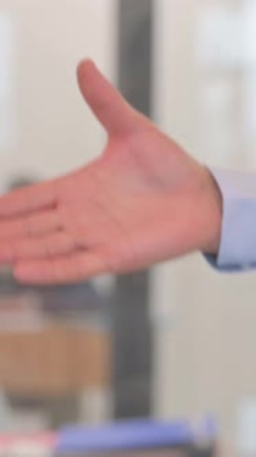 Close up of Shaking Hands in Office, vertical video