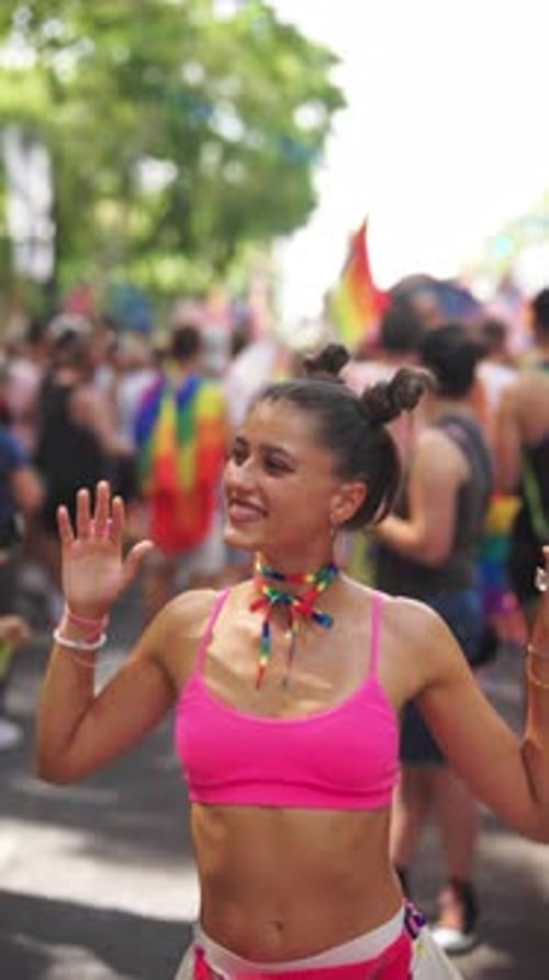 Woman Dancing at a Joyful Pride Parade