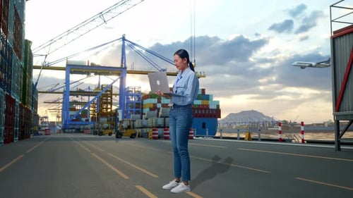 Asia Female Use Laptop And Feels Dissapionted at Port with Ship