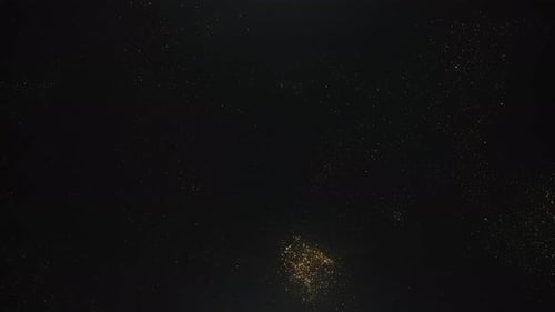 Goldene Glitzerpartikel