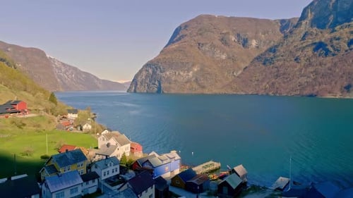 Calm sea on a sunny day in the Aurlandsfjord in Norway. Drone dolley shot