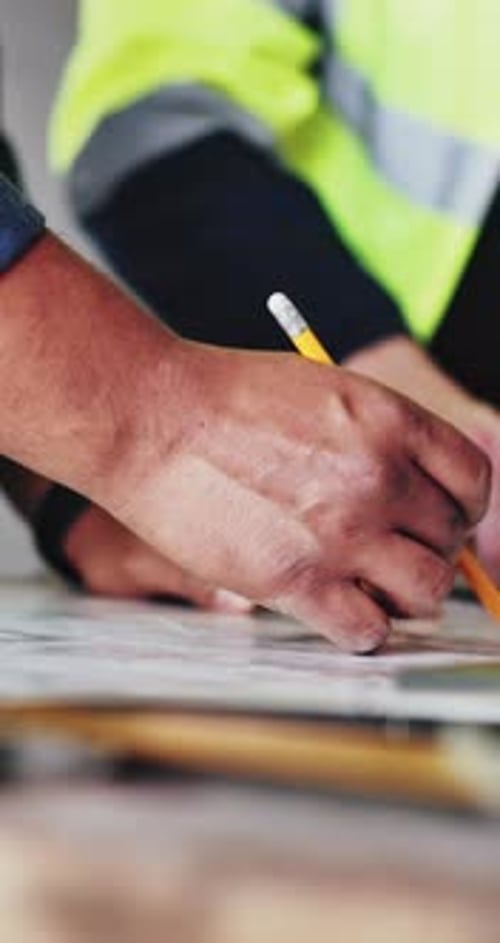 Hands, architect and writing with team for floor plan, review and real estate development