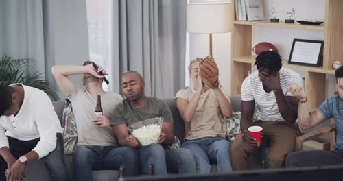 Friends Celebrate and React While Watching Sports