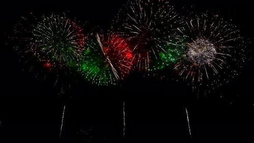 Bright Fireworks Light Up the Dark Night Sky in a Dazzling Display of Color and Sound