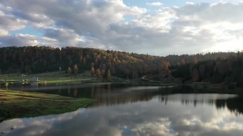 view of a lake surrounded by trees