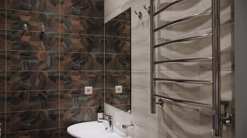 Shower on wall design in bathroom.