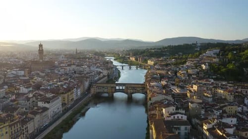 Ponte Vecchio Bridge at Sunrise. Florence, Italy. Cinematic Approaching Shot