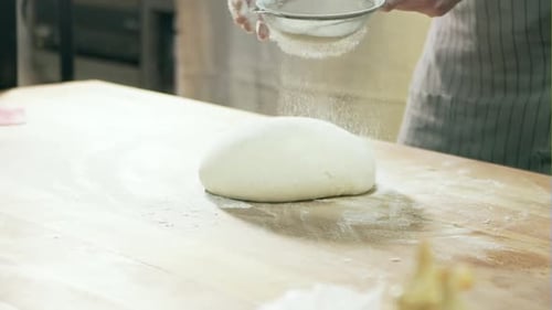Male Hands Preparing Dough for Bread
