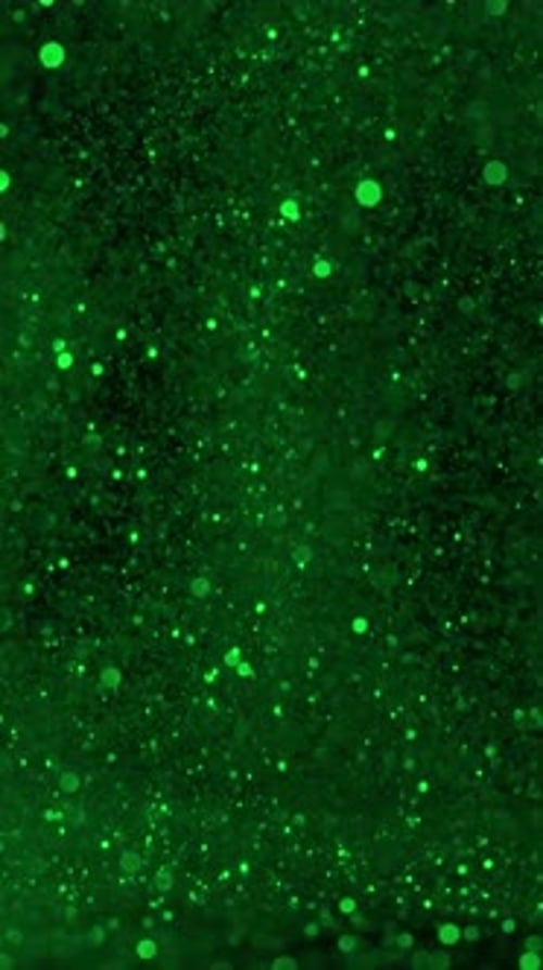 Vertikale Ansicht des Hintergrunds fallender Glitzerpartikel