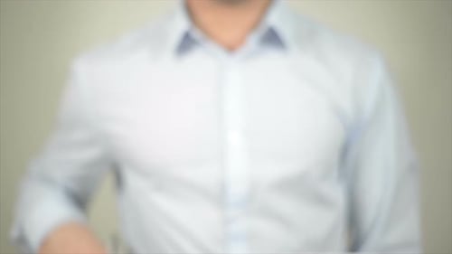 CMS Man Writing on Transparent Screen