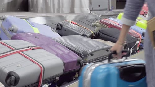 Luggage on Airport Conveyor Belt