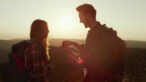 Romantic Mountain Proposal at Sunset