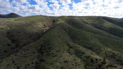 Aerial view of green mountains and hills, United States.