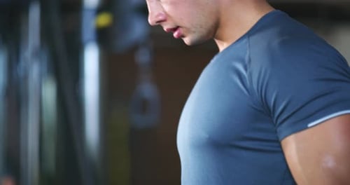 Dumbbell rack, arm workout and man put row weights, equipment or weightlifting tools after sweaty