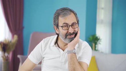 Middle-aged man with toothache.