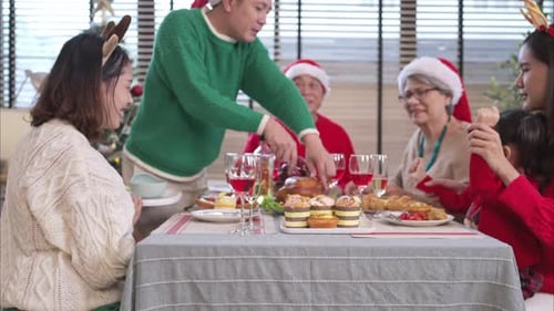 Family Celebrates Christmas Holiday Together at Home