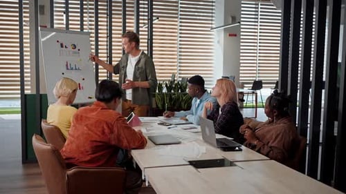 Team Attends Presentation at Modern Office Meeting