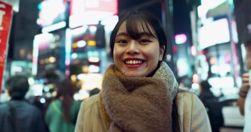 Travel, happy and face of Japanese woman in the city on exploring vacation, adventure or holiday