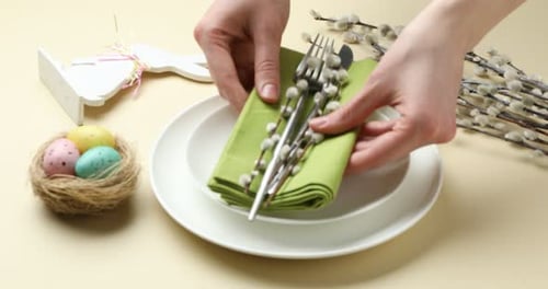 Elegant Easter Table Setting with Plates and Decor