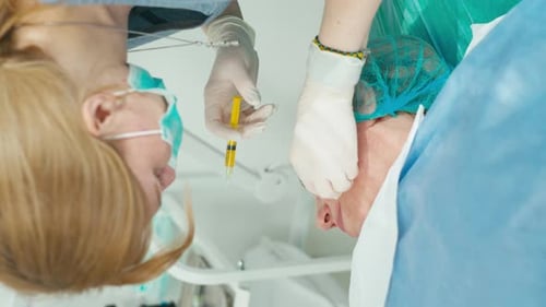 Woman Getting Facial Injection in Hospital Setting