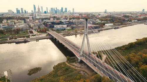 Aerial panorama of Warsaw, Poland at sunrise including Swietokrzyski Bridge over the Vistual river a
