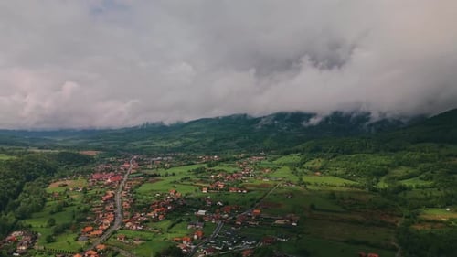 Aerial View of a Scenic and Picturesque Mountainous Village Surrounded By Beautiful Lush Greenery