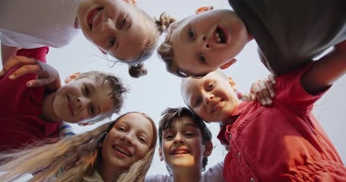 Happy Teenagers Bonding in a Circle Sharing Joyful Summer Moments