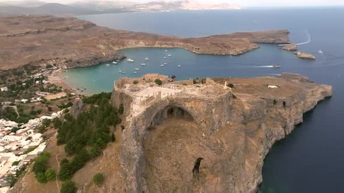 Acropolis of Lindos town and white houses in Rhodes island Greece