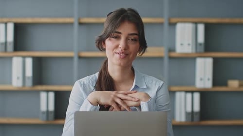 Young Woman Teaching an Online Lesson From Her Home Office