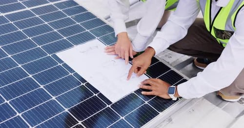 Blueprint, solar panels or hands of engineering people planning construction or photovoltaic roof