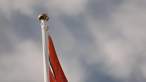 Close-up Of Flagpole Displaying The Flag Of Norway