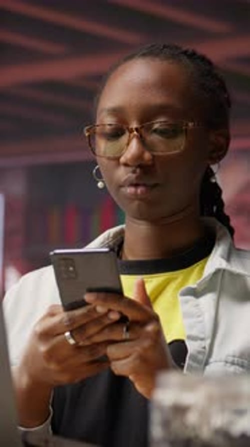 Vertical Video Happy Woman Relaxing in Apartment Texting Friends on Smartphone