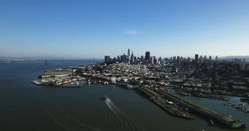 Drone shot overlooking the cityscape of Fisherman’s Wharf, in sunny San Francisco