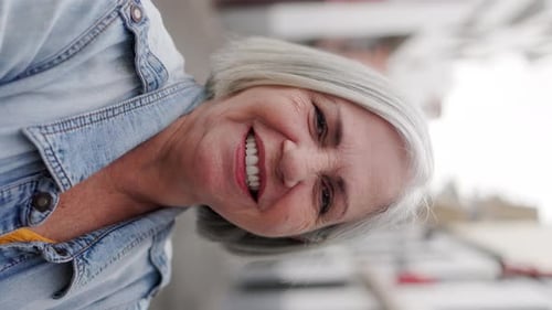 Mature Woman with Gray Hair Smiling