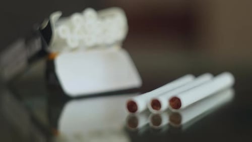 An Open Pack of Cigarettes on the Table the Focus Shifts to Cigarettes Bad Habit Nicotine Addiction
