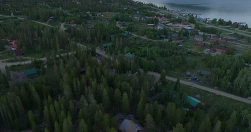 Tilting Drone shot of Shadow Mountain Lake at sunset in Colorado